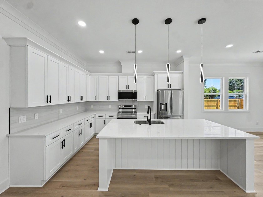 Welcome to this stunning brand-new construction offering the - photo 8