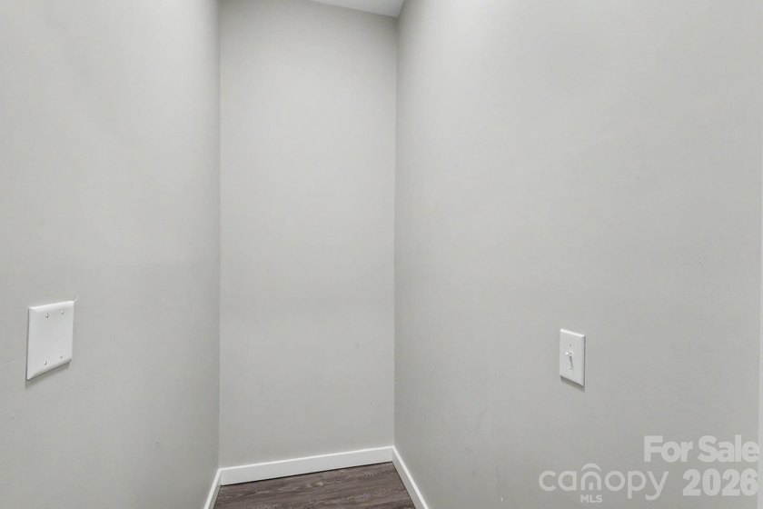 Perched on the top floor of one of NoDa's most coveted addresses - photo 12