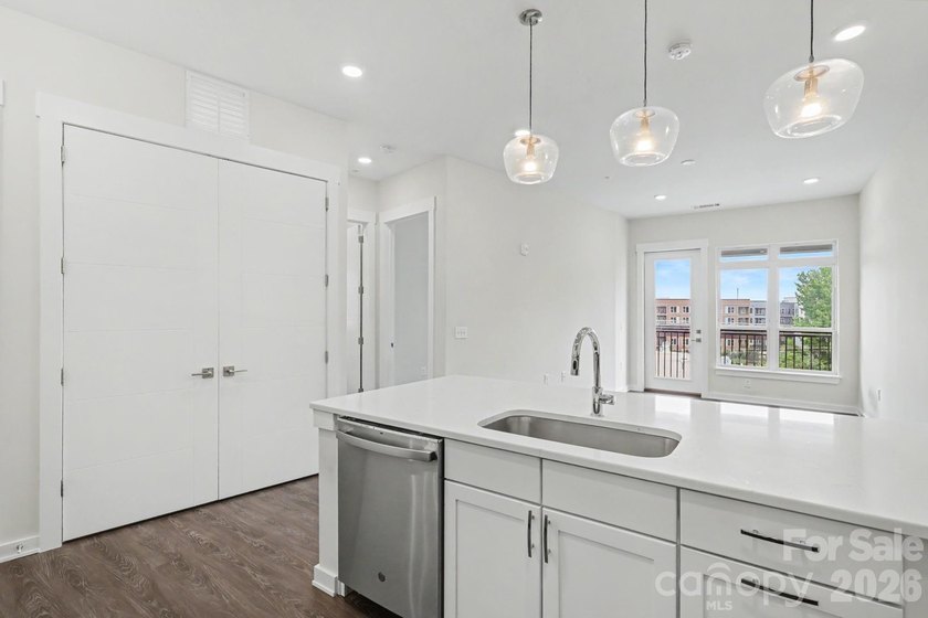 Perched on the top floor of one of NoDa's most coveted addresses - photo 17