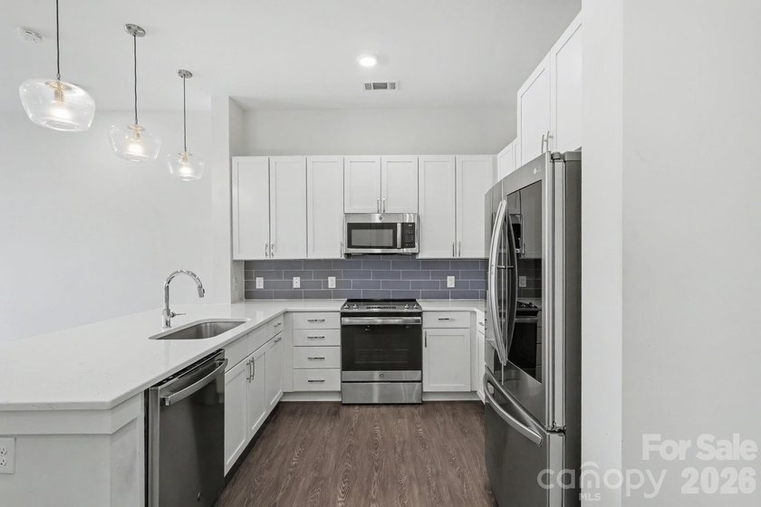 Perched on the top floor of one of NoDa's most coveted addresses - photo 19