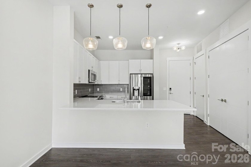 Perched on the top floor of one of NoDa's most coveted addresses - photo 21
