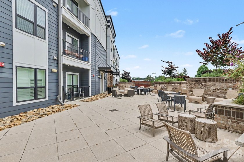 Perched on the top floor of one of NoDa's most coveted addresses - photo 33