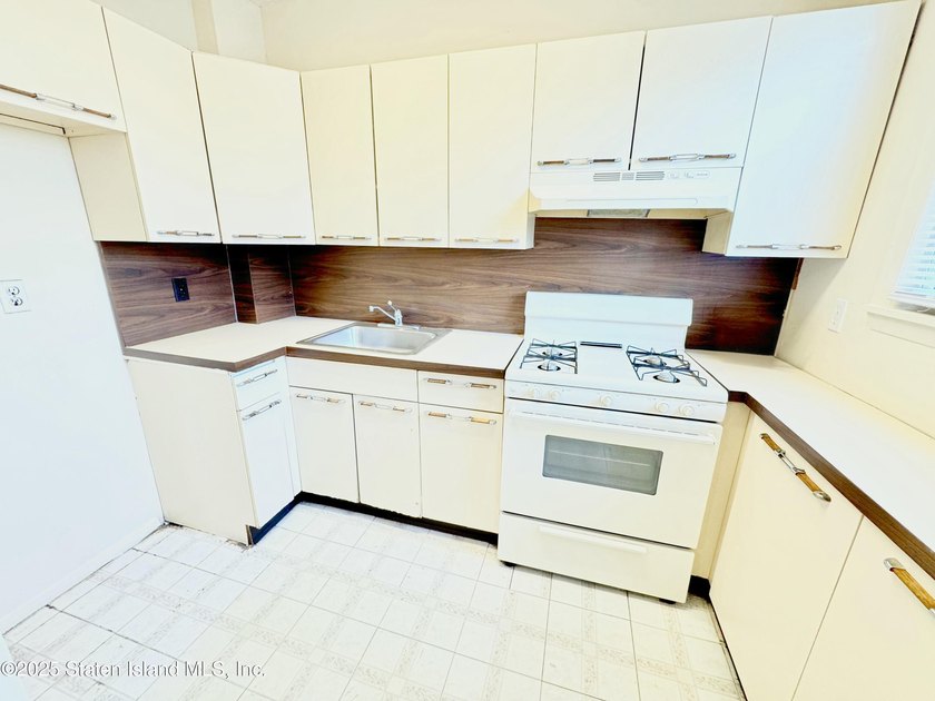 Discover this Large Fabulous Impeccable, 3 Family Home. This - photo 13