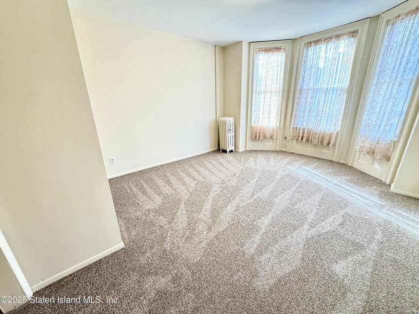 Discover this Large Fabulous Impeccable, 3 Family Home. This - photo 16