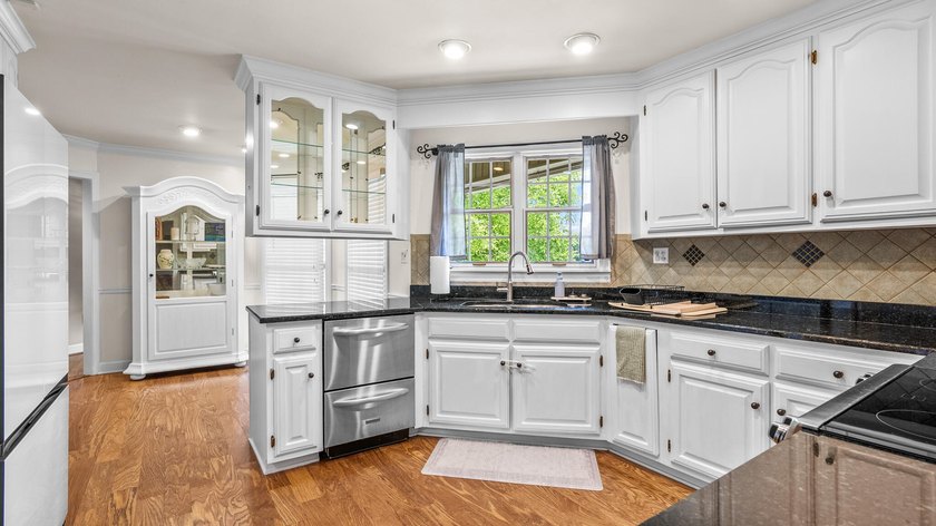 Tucked just minutes from the lake, this spacious home offers - photo 14