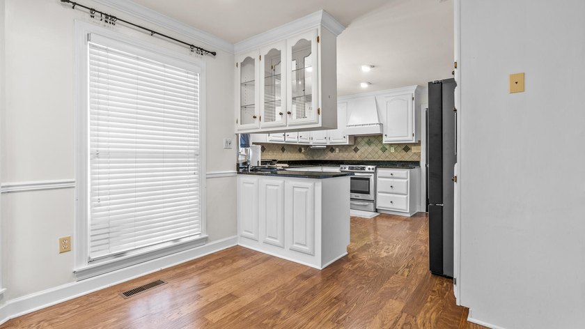 Tucked just minutes from the lake, this spacious home offers - photo 15
