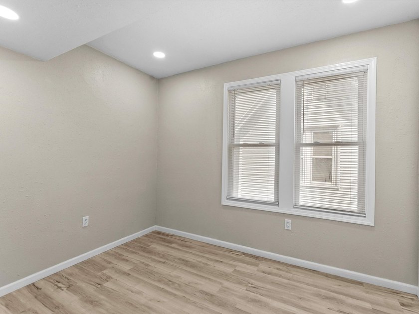 This beautifully renovated 5-bedroom, 2-bath home has been - photo 18