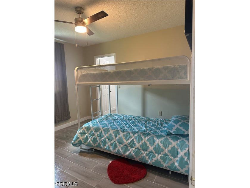 This 3/2 house with open floor plan, heated pool, large back - photo 6
