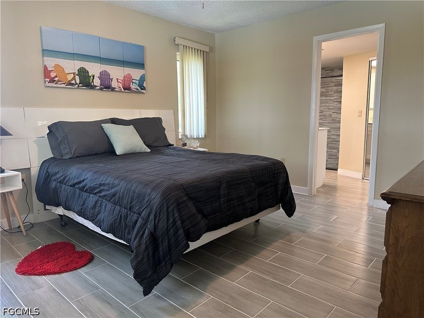 This 3/2 house with open floor plan, heated pool, large back - photo 7