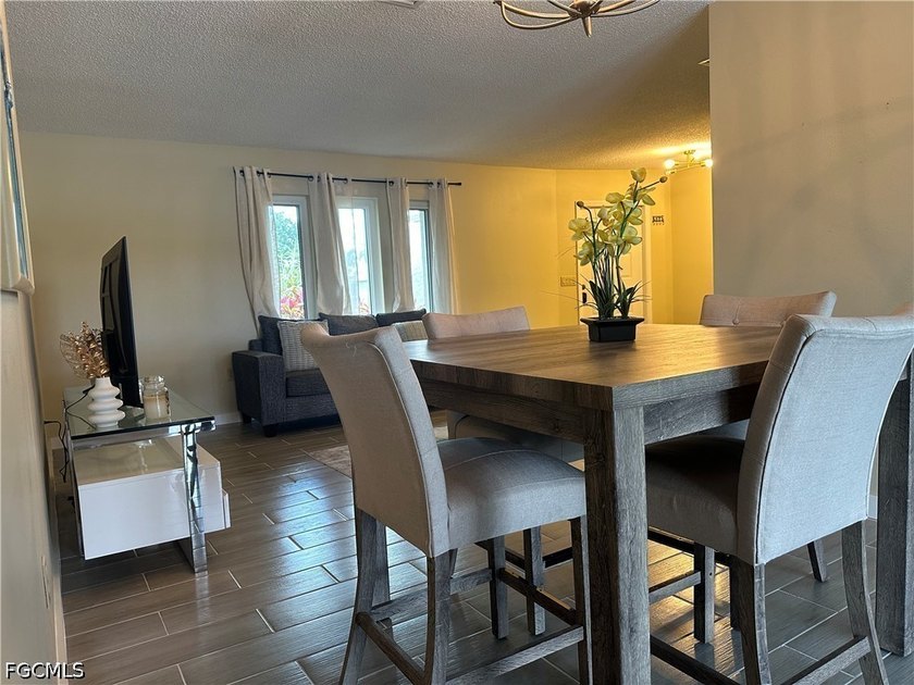 This 3/2 house with open floor plan, heated pool, large back - photo 8