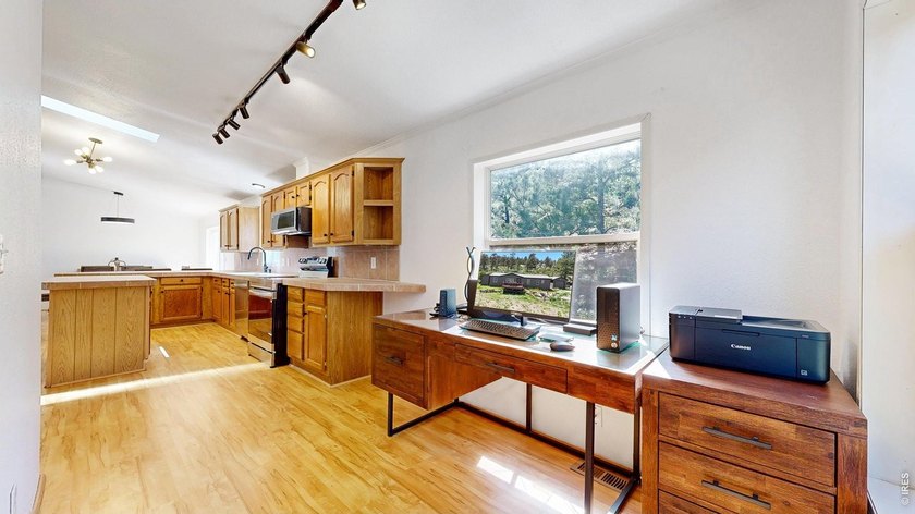 Escape to the tranquility of Carter Lake living. This property - photo 18