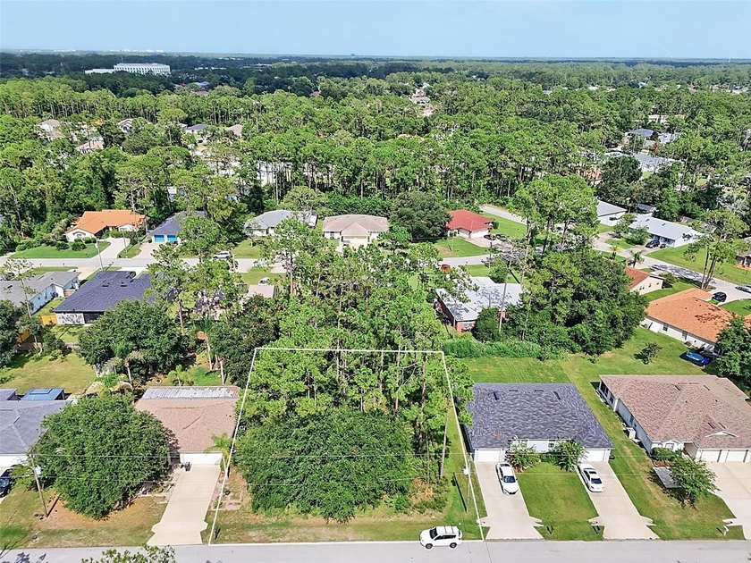The beach is certainly within reach on this new lot listing! - photo 3