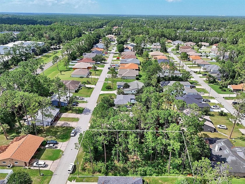 The beach is certainly within reach on this new lot listing! - photo 5