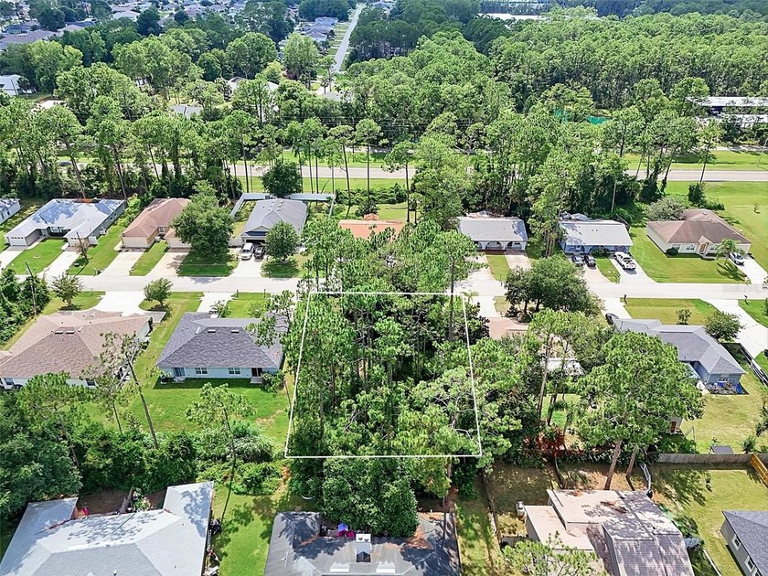 The beach is certainly within reach on this new lot listing! - photo 7