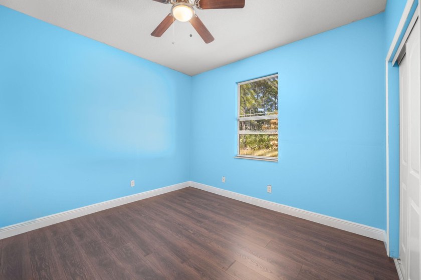 Private setting down a long dirt road on 1.15 acres. Property - photo 25
