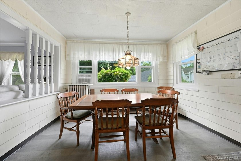 This charming country home on a quiet street in Port Jefferson - photo 9