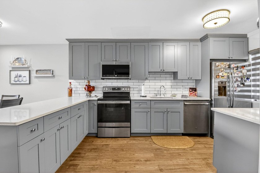This turnkey 55+ condo is nestled within the sought-after - photo 4