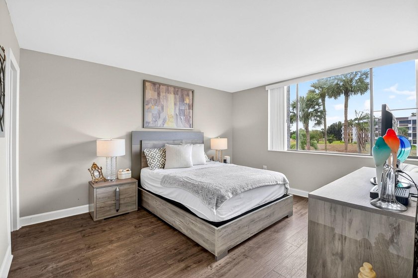 This turnkey 55+ condo is nestled within the sought-after - photo 6