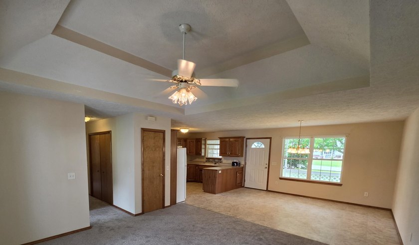 1,255 Square foot home with an open floor plan has a vaulted - photo 10
