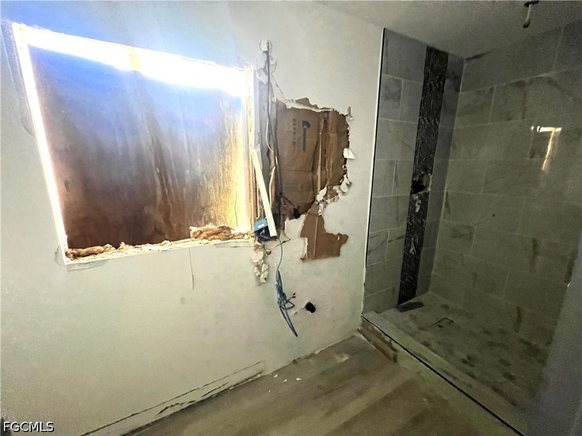 Property requires a full renovation. Damage includes missing - photo 7