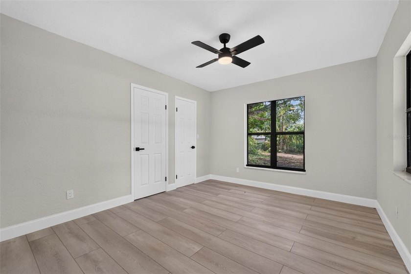 Welcome to this beautifully renovated 3-bedroom, 2-bathroom home - photo 9