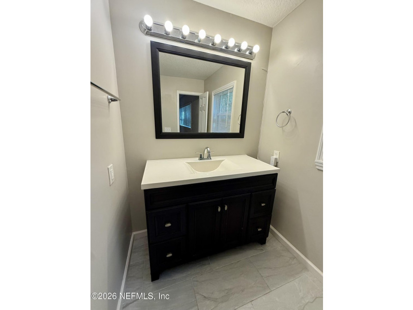 Charming three bedroom/two full bath located in the desirable - photo 11
