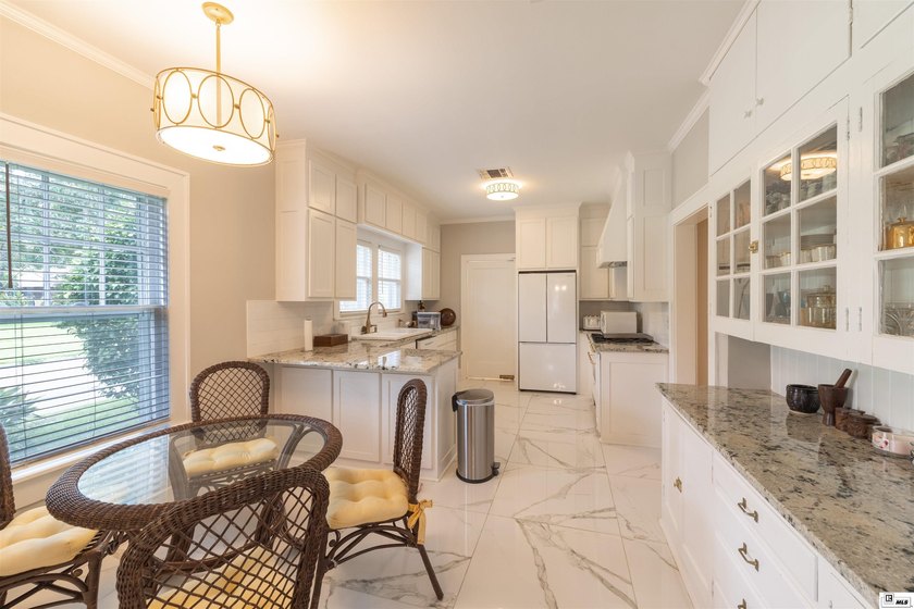 Welcome to 501 Auburn, a beautifully maintained 4-bedroom - photo 9
