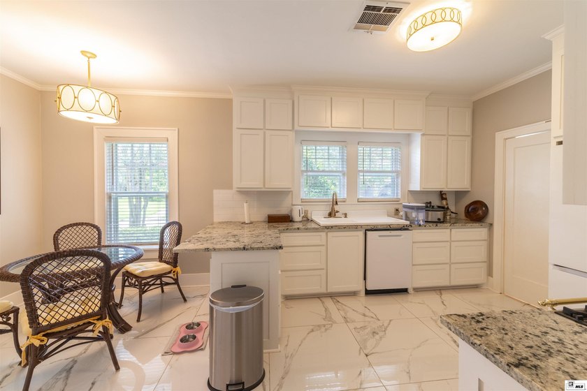 Welcome to 501 Auburn, a beautifully maintained 4-bedroom - photo 10