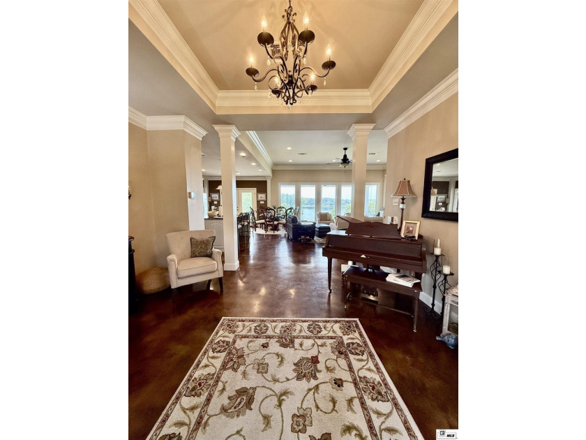 Nestled on a hilltop, this stunning lake home offers expansive - photo 6
