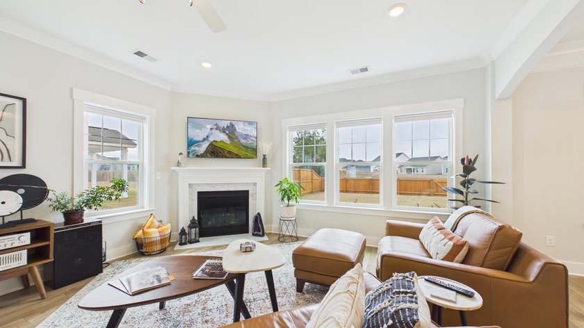 Showing like a designer model, this home has a feeling of - photo 7