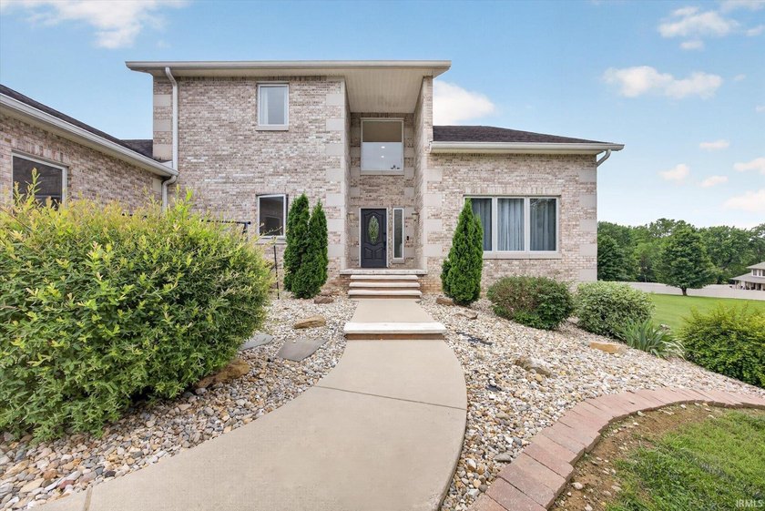 This custom-built one-and-a-half story home over a full walk-out - photo 3