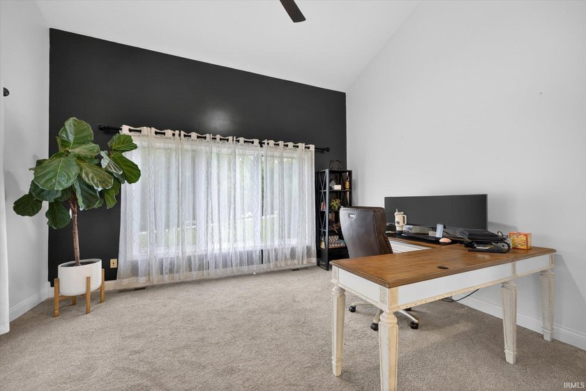 This custom-built one-and-a-half story home over a full walk-out - photo 4