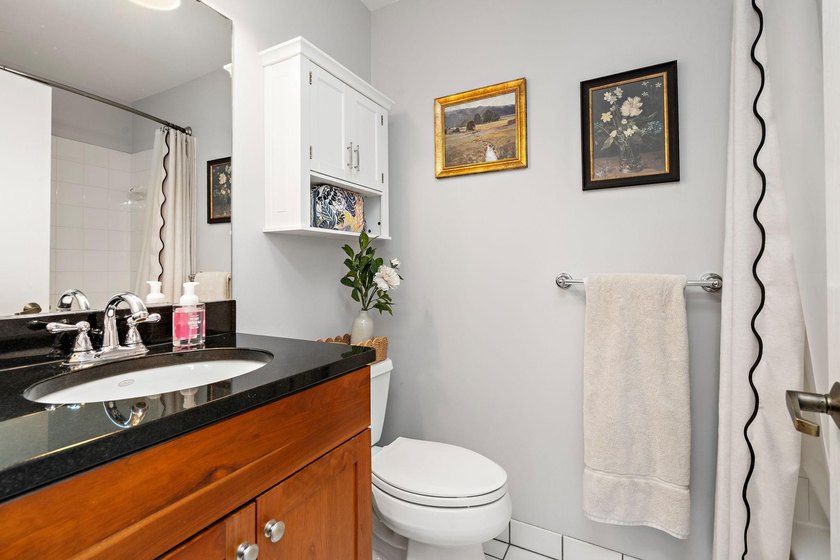 Welcome home to this beautifully updated corner unit offering an - photo 13