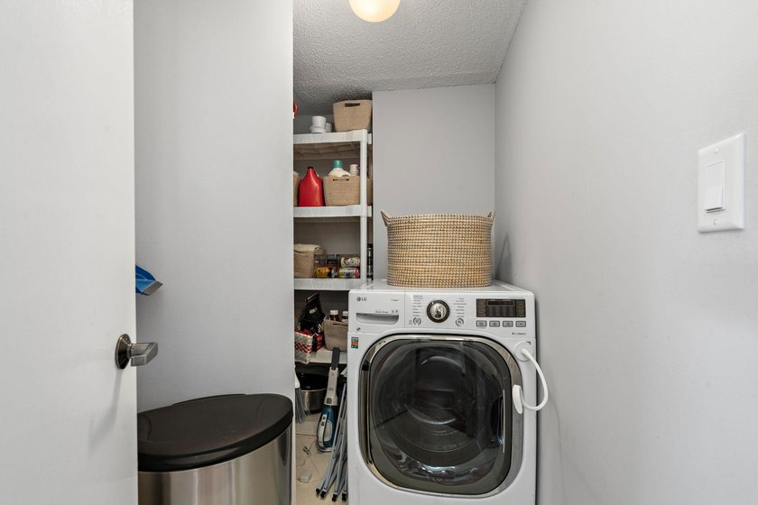 Welcome home to this beautifully updated corner unit offering an - photo 18
