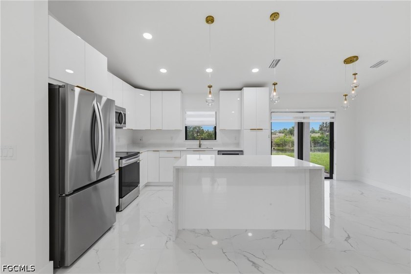 Welcome to this true gem that perfectly blends luxury with - photo 9
