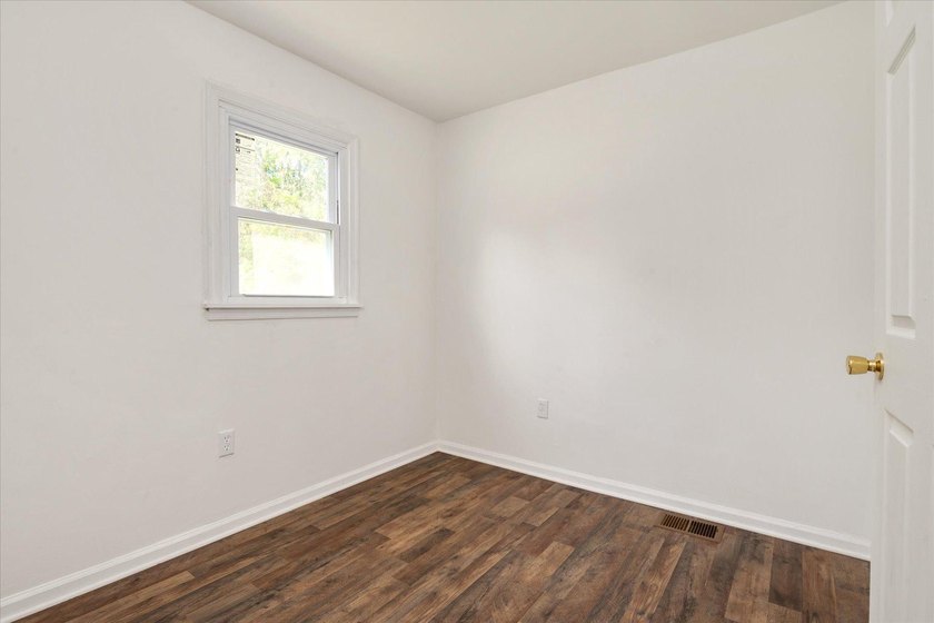 Move-in ready rambler with 4 bedrooms and 2.5 baths. The home - photo 19