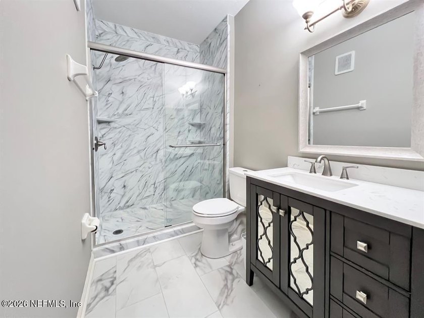 Exceptional 3-bedroom, 2-bathroom ground-floor condo in a gated - photo 25