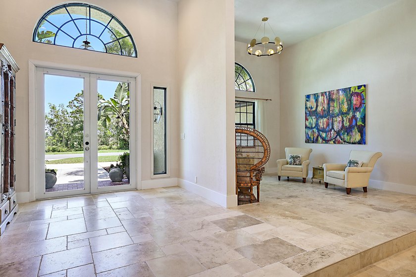Numerous luxury upgrades! Newer roof, complete impact - photo 7