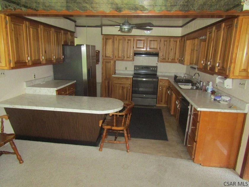 Nestled on 5.6 beautiful wooded acres in scenic Lower Turkeyfoot - photo 18