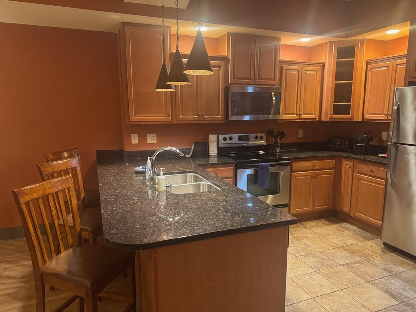 Exceptional value! This condo is located on the third floor at - photo 9
