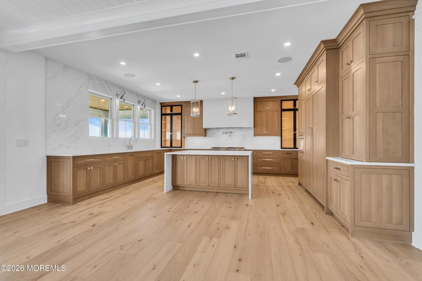 Spectacularly designed 5/6 bedroom, 6 bath bayfront home is - photo 7