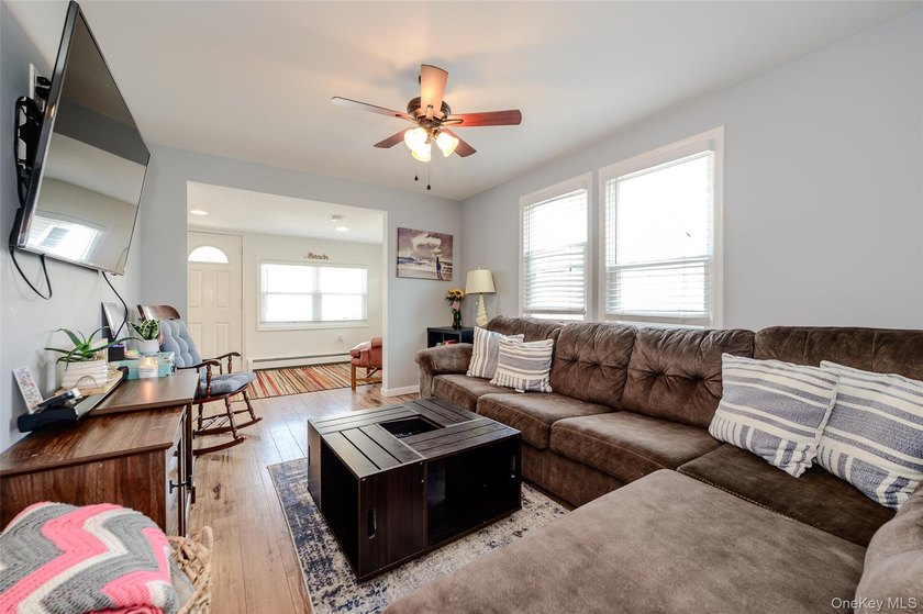 Welcome to this beautifully renovated raised ranch in Long - photo 7