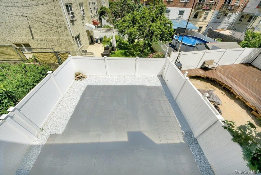 Tucked behind a custom wrought-iron gate, your own private oasis - photo 29
