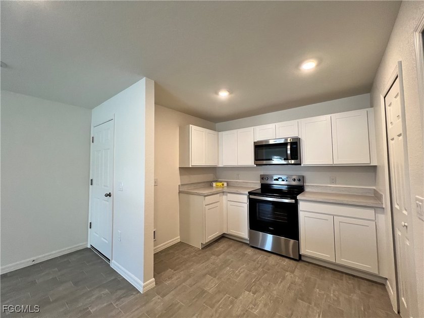 READY NOW!! The SAGO floor plan has three bedrooms, two full - photo 2