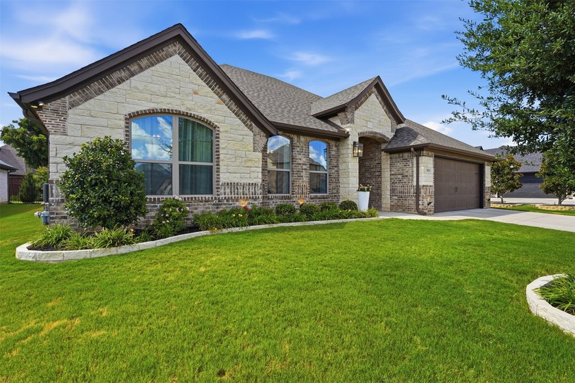 Located in the highly desirable Harbor Lakes community this - photo 2