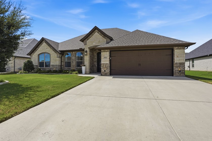 Located in the highly desirable Harbor Lakes community this - photo 3
