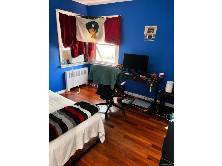 This well-maintained two-family home offers 4 spacious bedrooms - photo 6