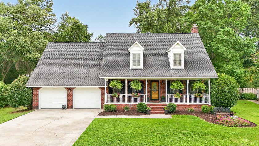 Welcome home to timeless Southern charm in the highly - photo 2