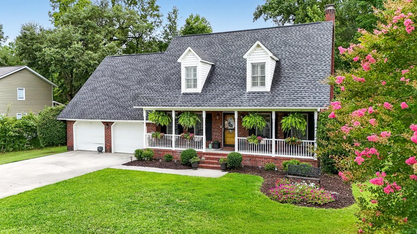 Welcome home to timeless Southern charm in the highly - photo 3