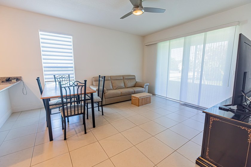 Experience the ultimate 55+ lifestyle in this elegant - photo 4